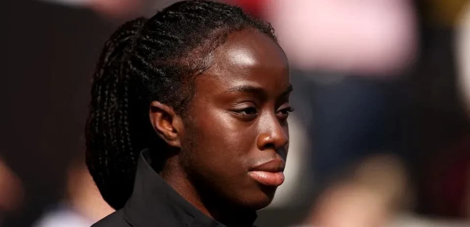 Athlete preparing for competition with focused expression