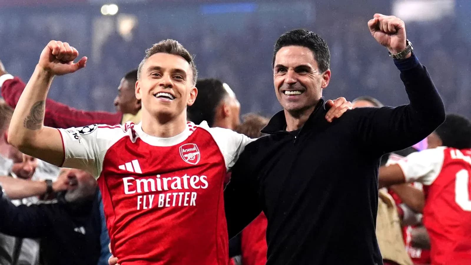 Arsenal players celebrating victory after match
