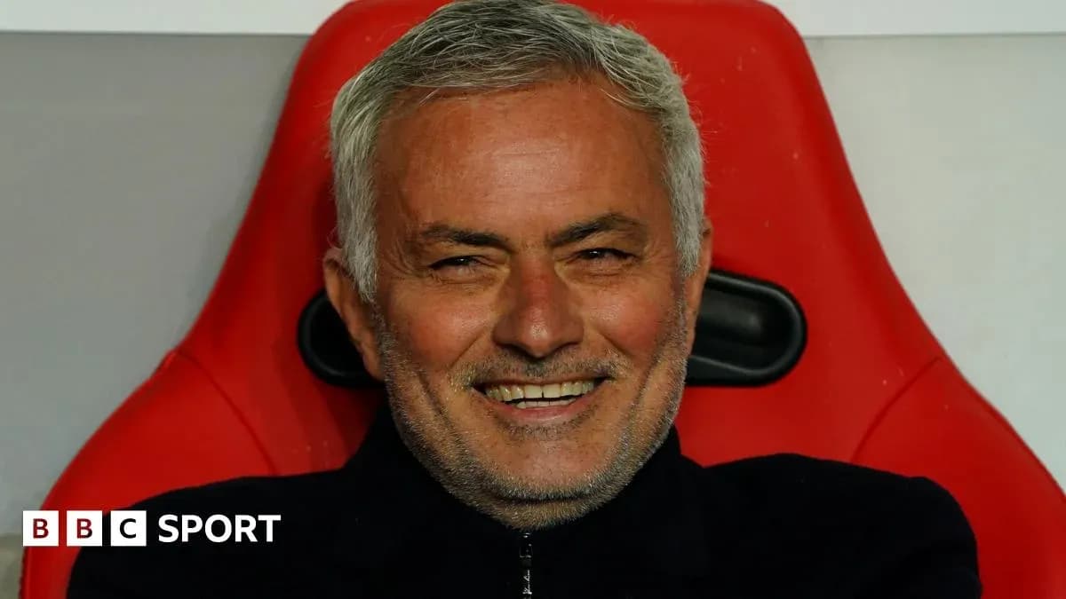 Coach sitting on bench during match