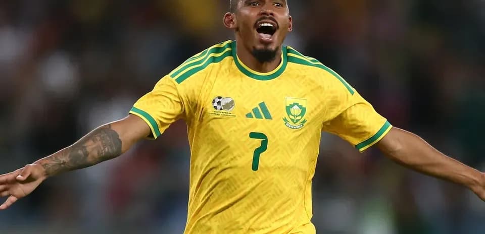 South African player celebrating after scoring goal