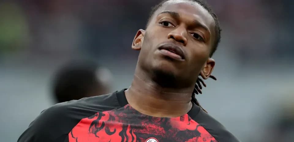 Player in AC Milan jersey during warm-up