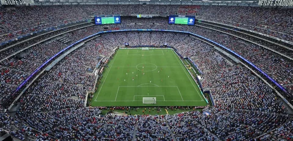 Crowd watching soccer match at MetLife Stadium