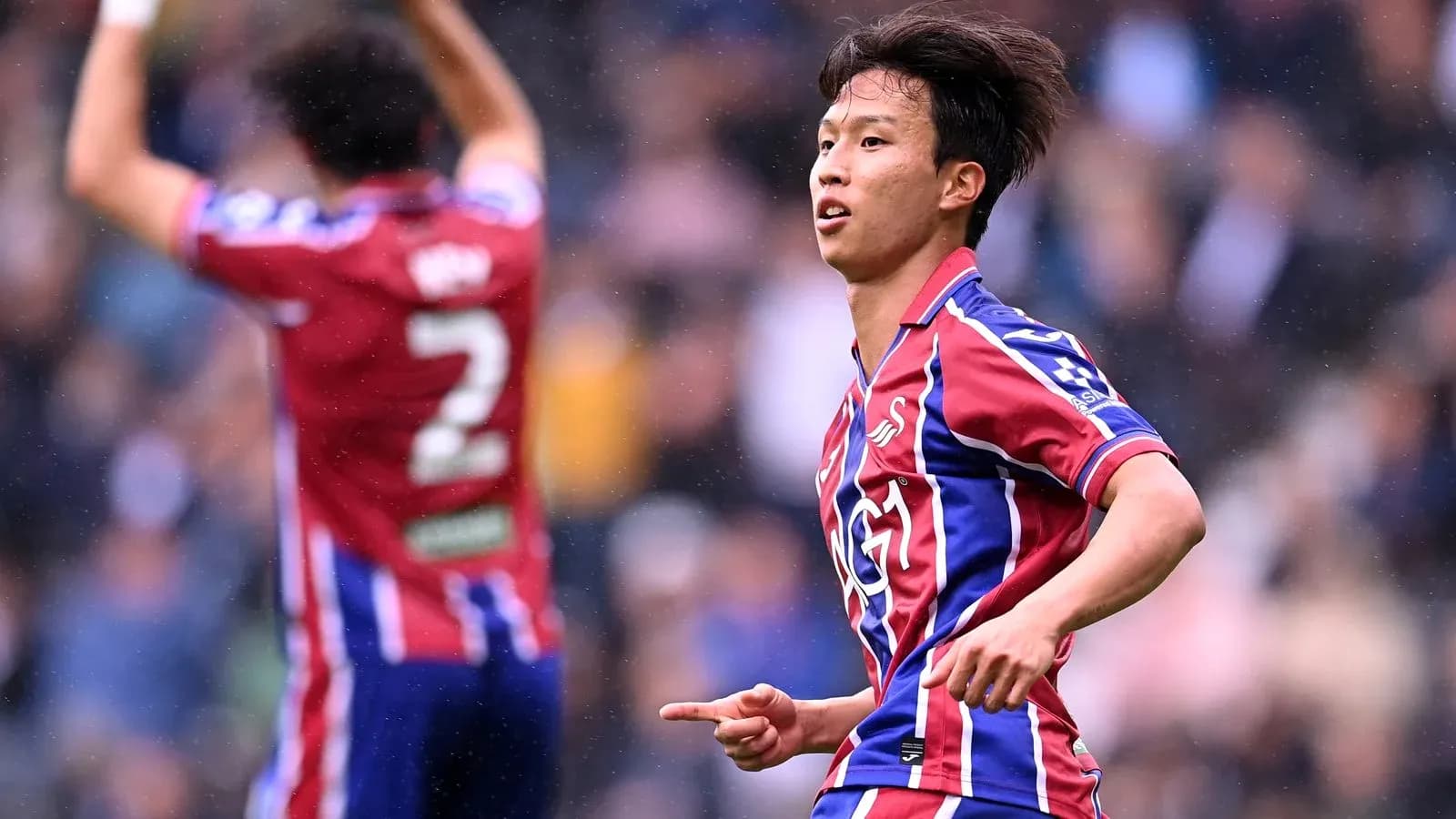 Player celebrating after scoring a goal during match