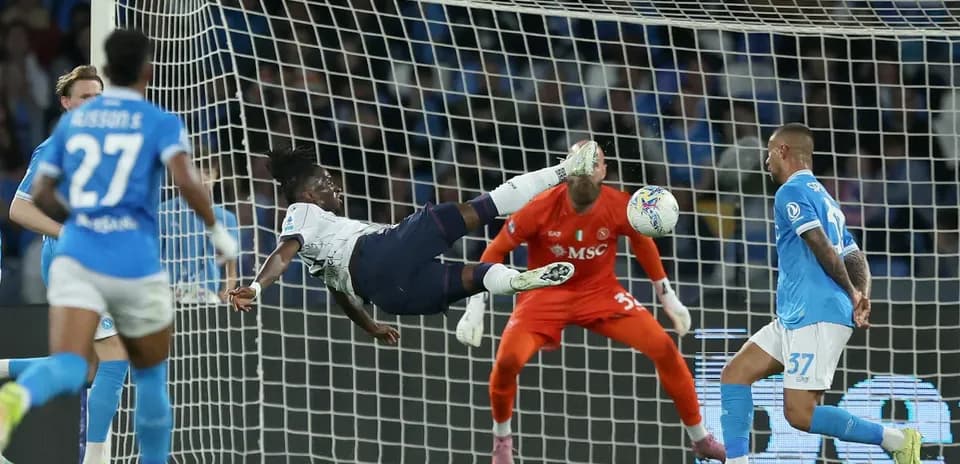 Player attempting a bicycle kick in match
