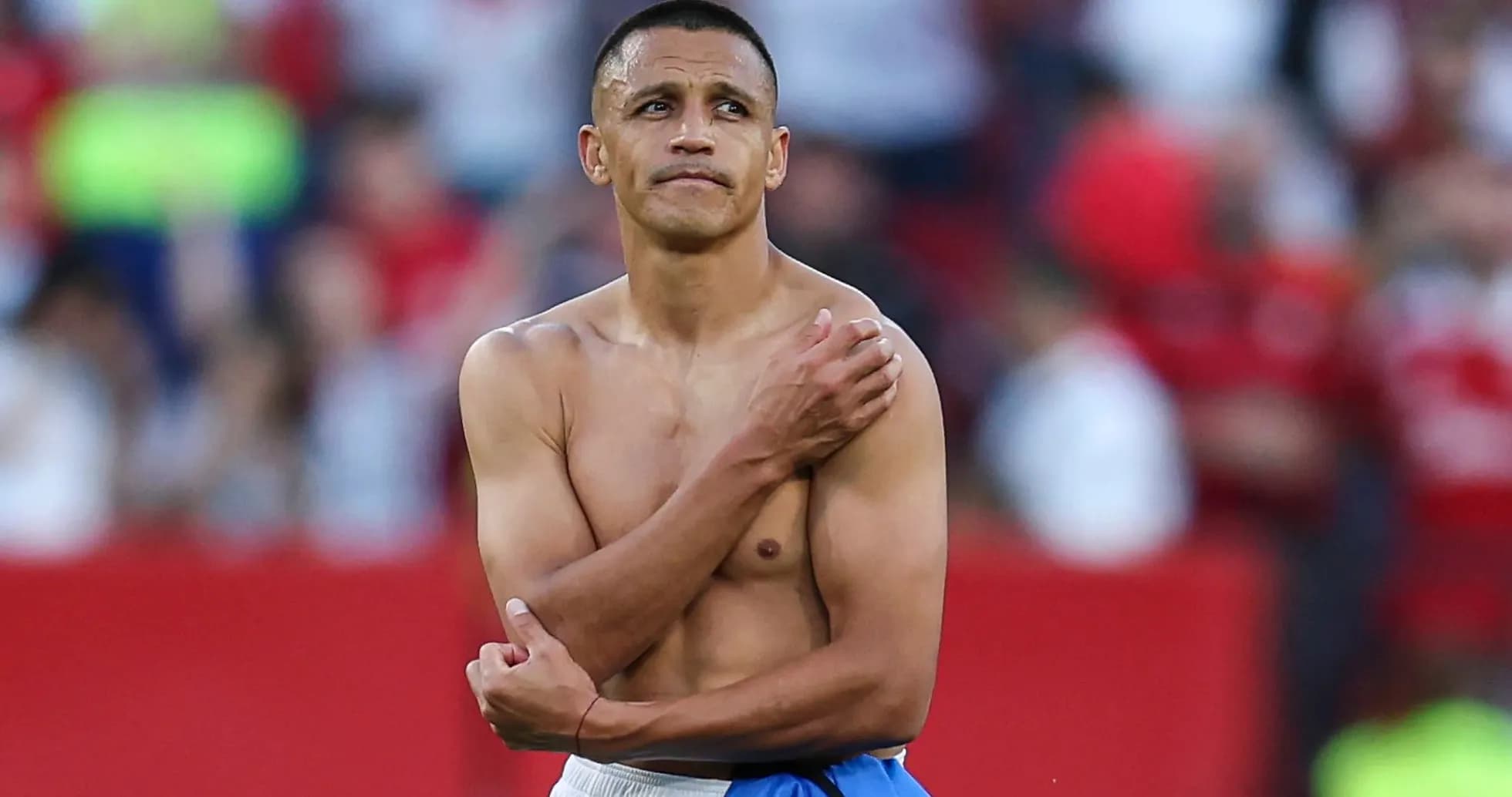 Player with bare torso during post-match scene