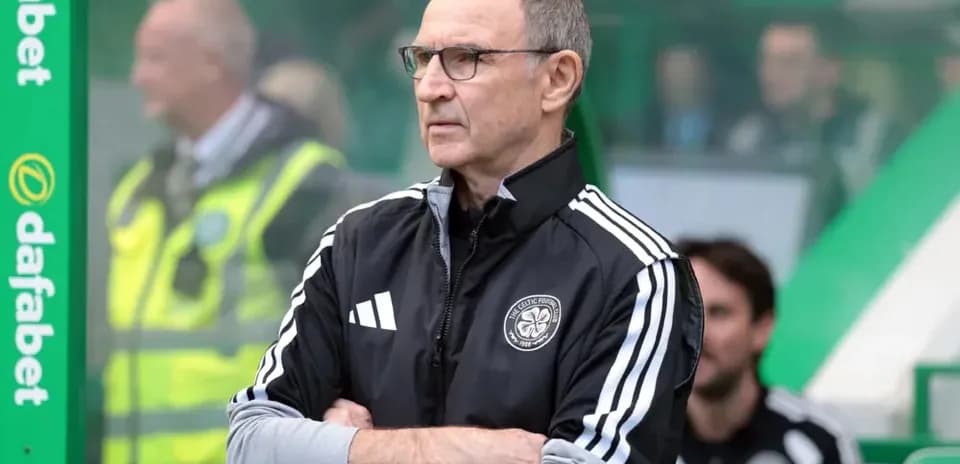 Manager observing the game from the sidelines