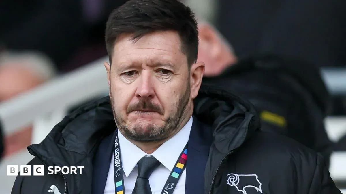 Manager looking serious on the sidelines during match