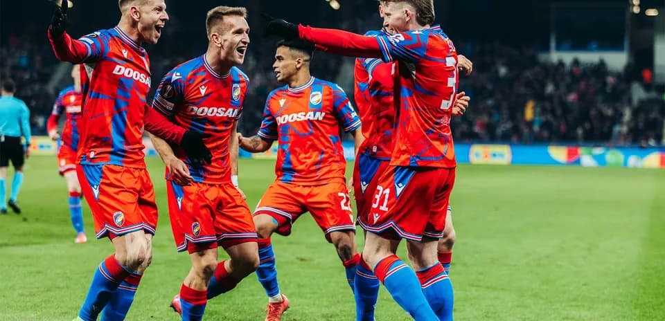 Plzen players celebrating a goal during match
