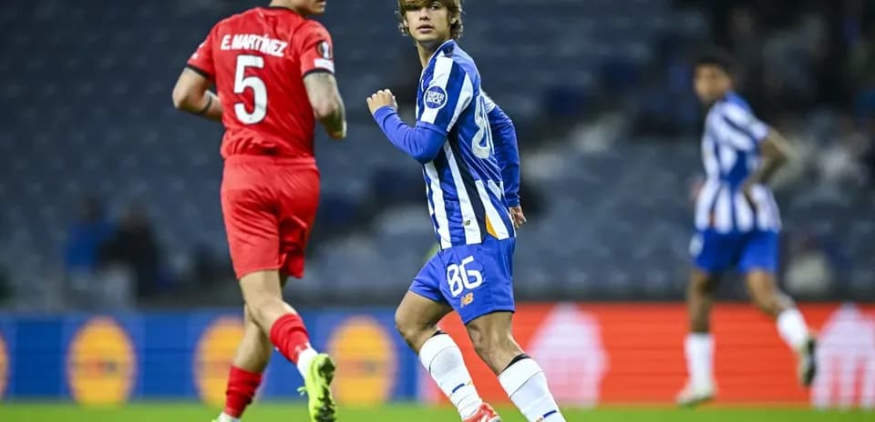 Player in blue jersey running during match