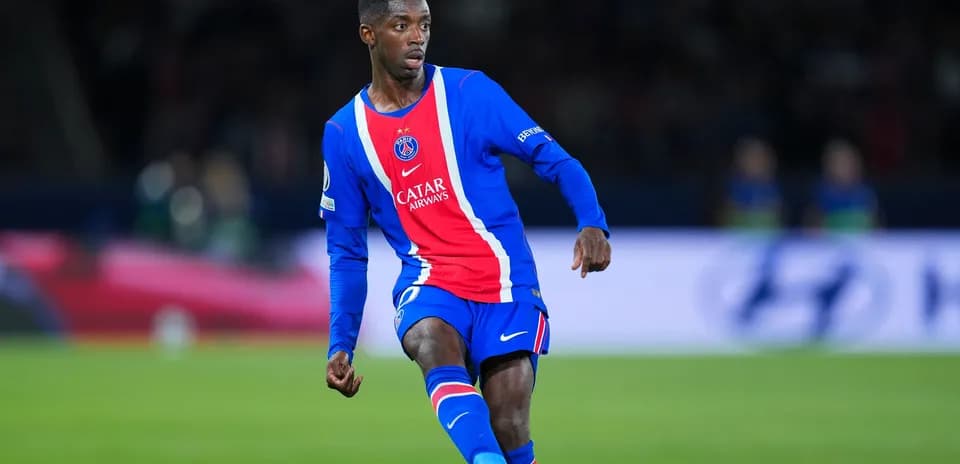Player in PSG kit during match action