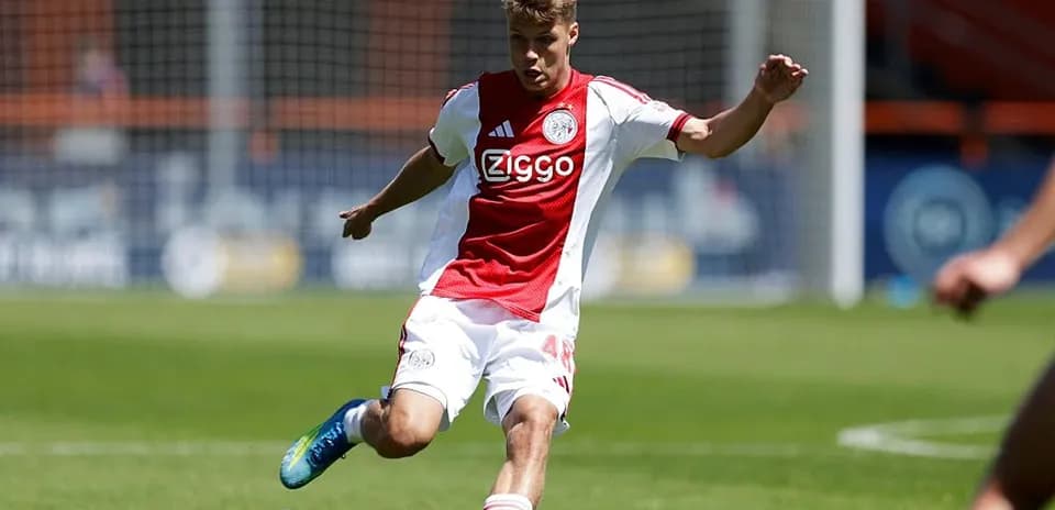 Player kicking the ball during a match