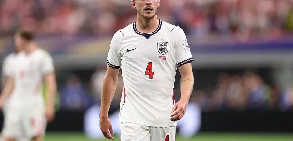 Player walking on field during international match