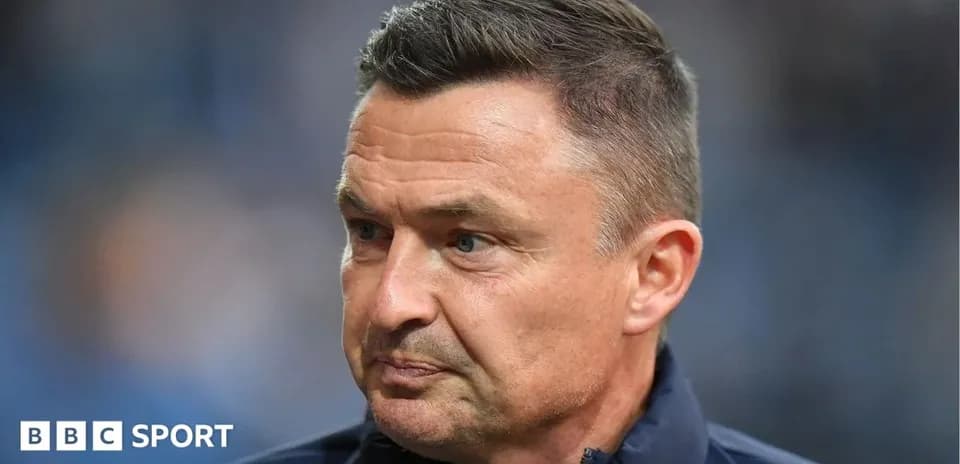 Manager looking serious during a match