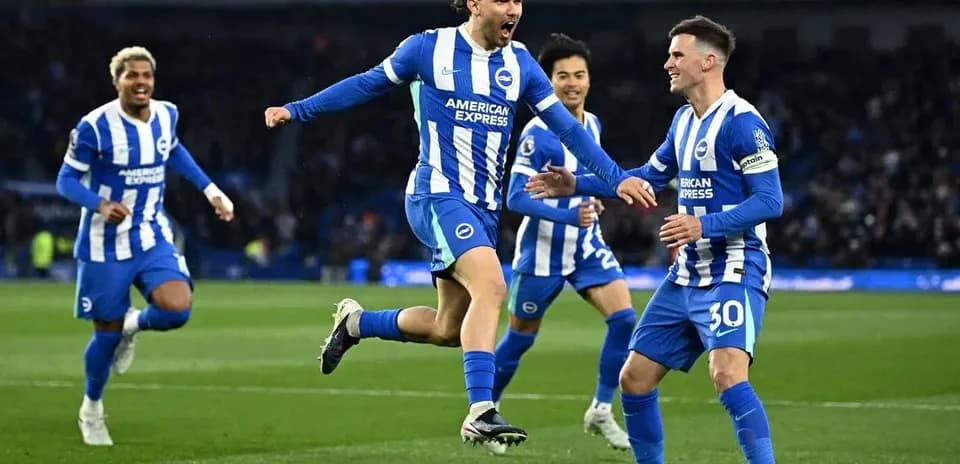 Brighton players celebrating a goal during match