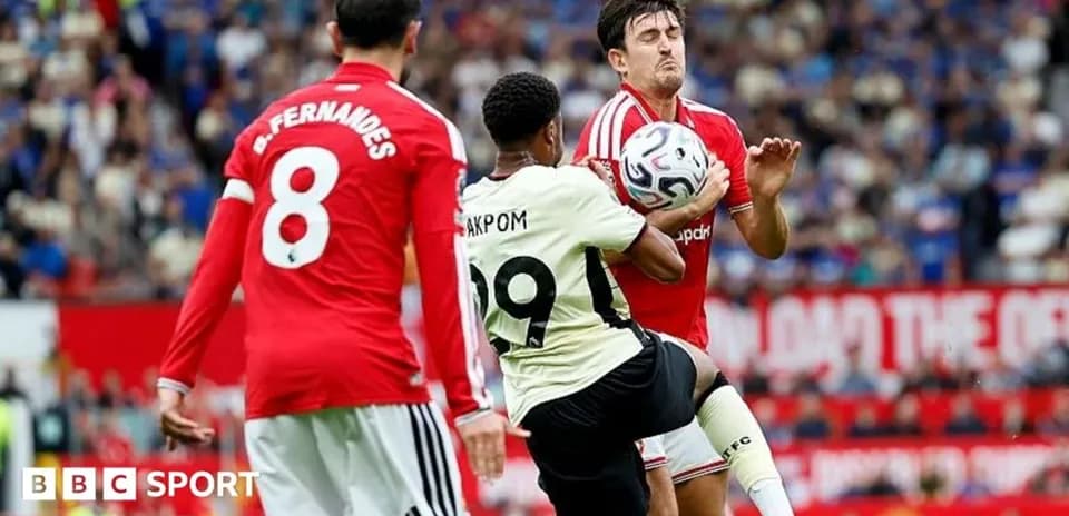 Player attempting to control ball during match action
