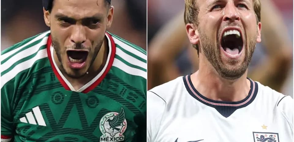 Raul Jimenez and Harry Kane celebrating