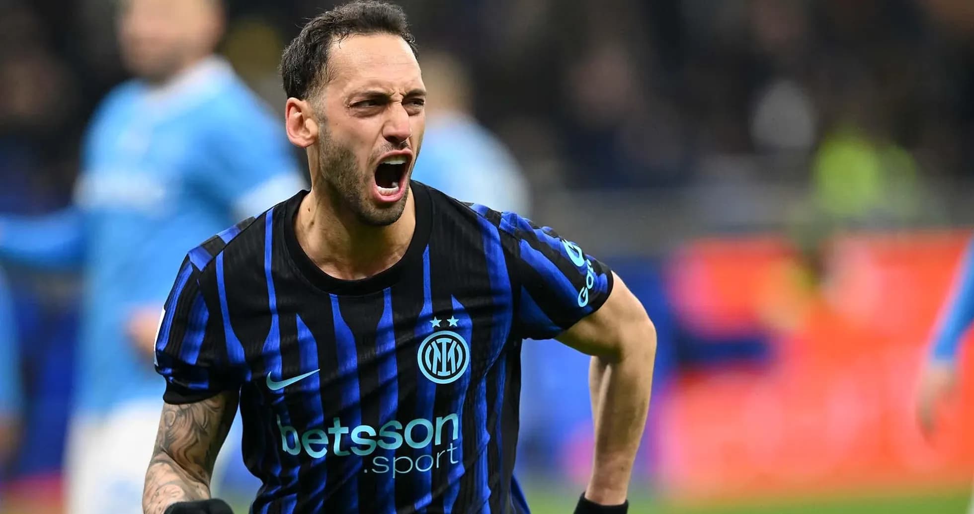 Hakan Çalhanoğlu celebrating a goal for Inter