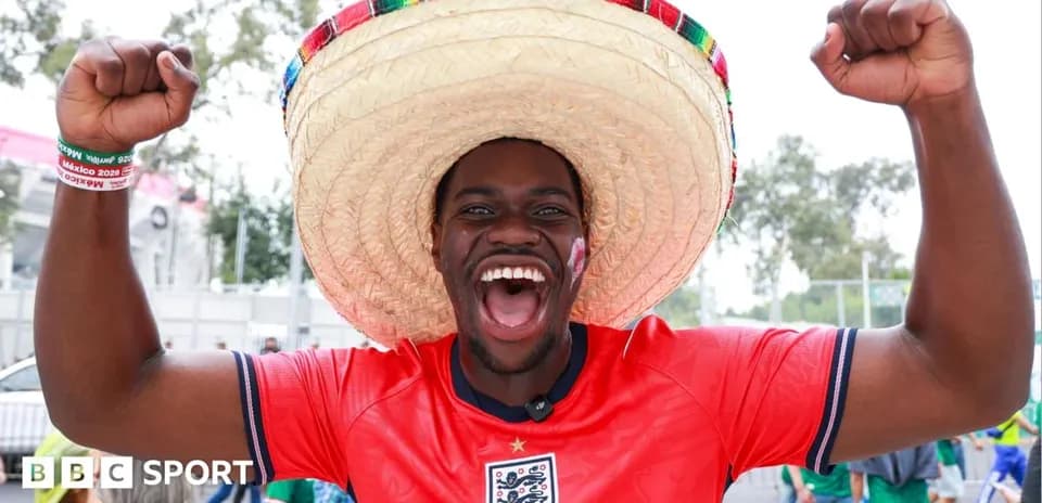 Fan celebrating with sombrero and England jersey