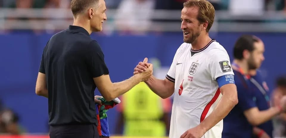 Manager and player shaking hands after match