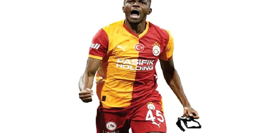 Player celebrating a goal in Galatasaray jersey