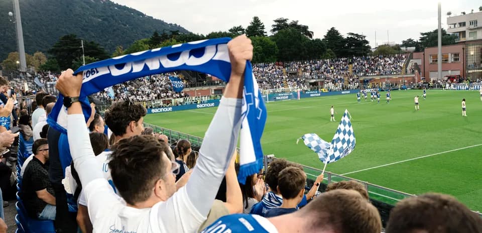 Fans celebrating during Como vs Venezia match