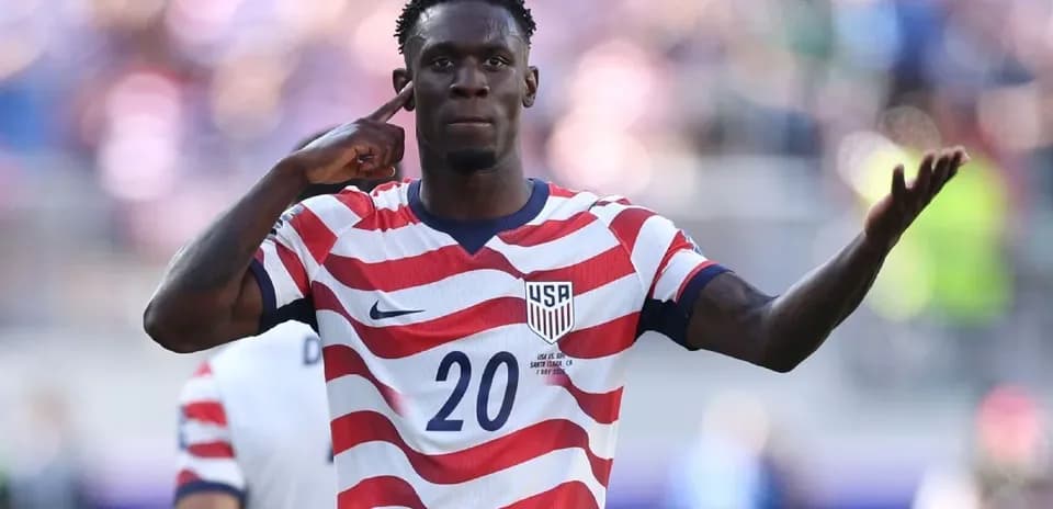 Player celebrating with hand gesture during match