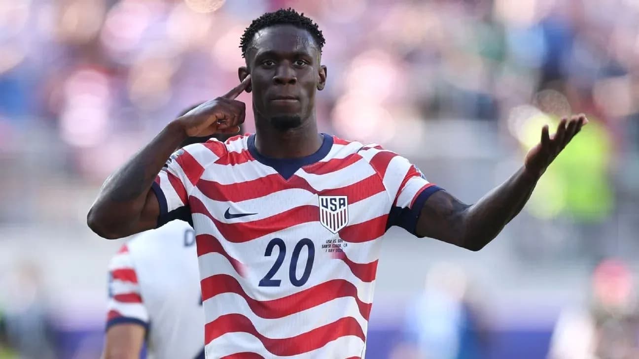 Player celebrating with hand gesture during match