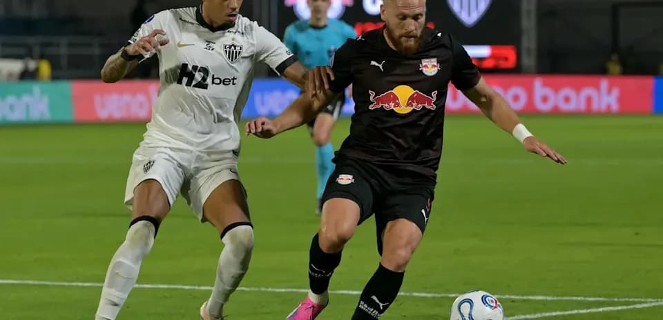 Two players contesting the ball during a match
