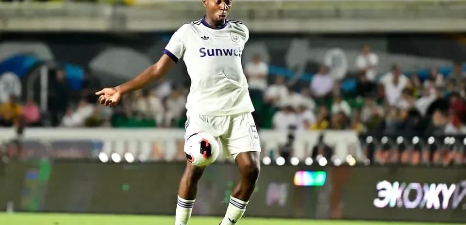 Anderlecht player controlling the ball during match