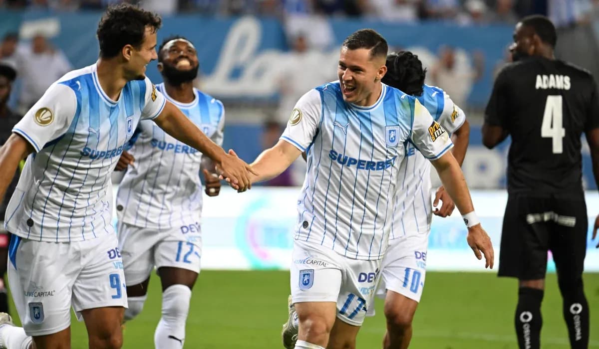 Players celebrating a goal during match