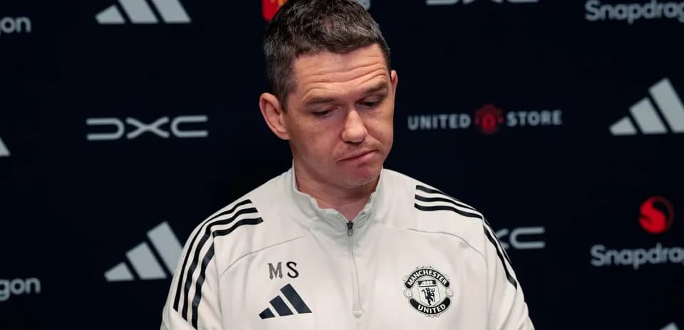 Manchester United coach speaking at press conference