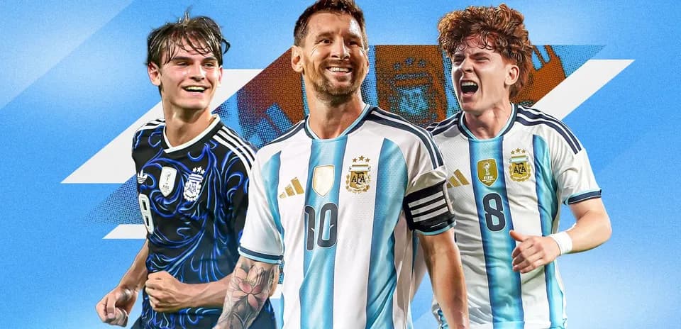 Three Argentine players celebrating with their national jerseys