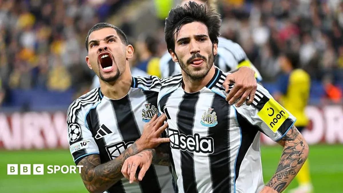 Newcastle players celebrating a goal on the pitch