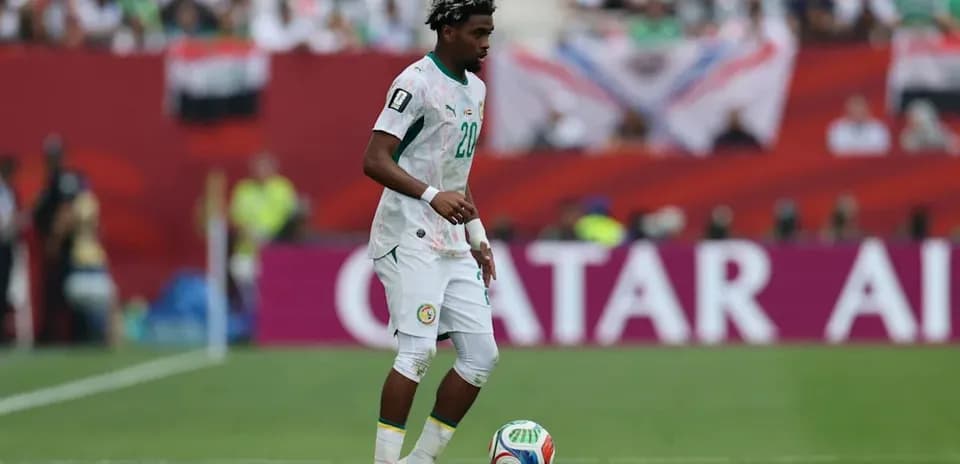 Player from Senegal controlling the ball during match