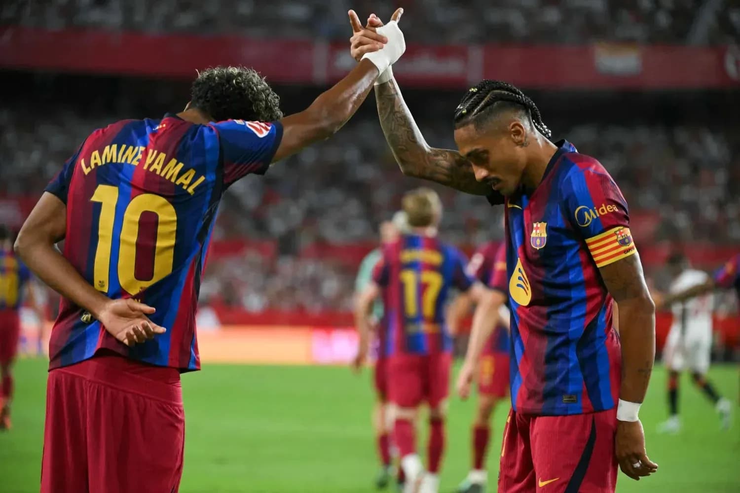 Barcelona players celebrating during La Liga match