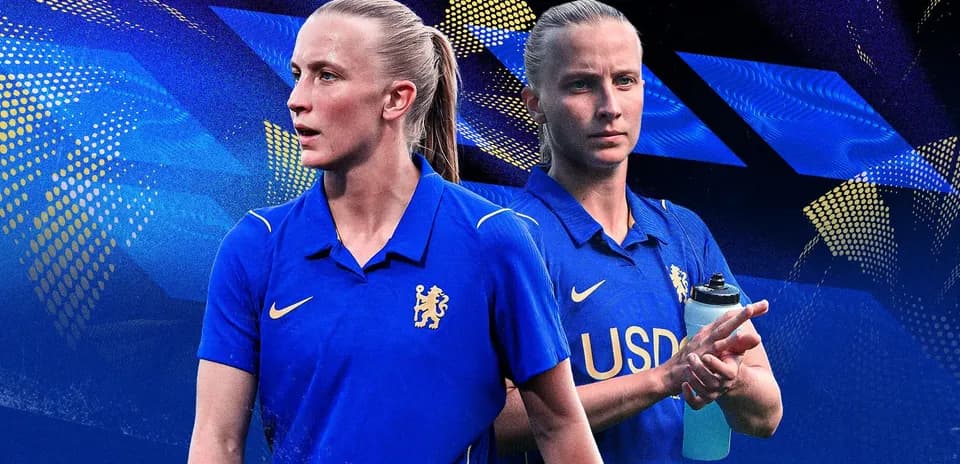 Female player in blue kit with water bottle