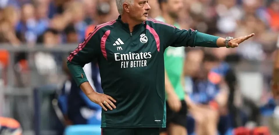 Coach directing players during match on sidelines