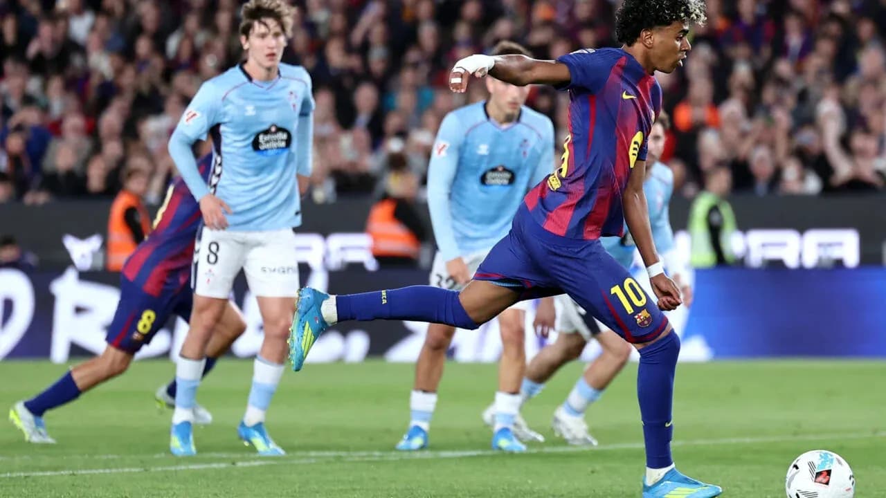 Player taking a penalty kick during match