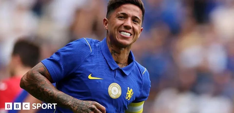 Player celebrating in blue Chelsea jersey on pitch