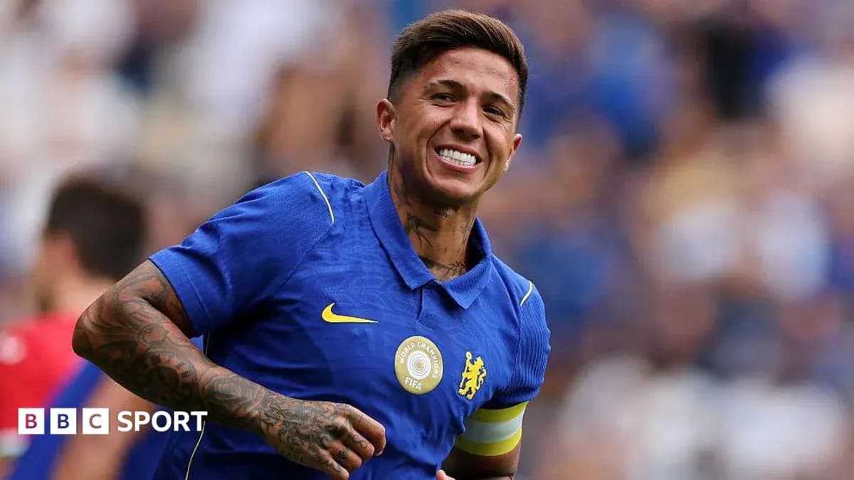 Player celebrating in blue Chelsea jersey on pitch