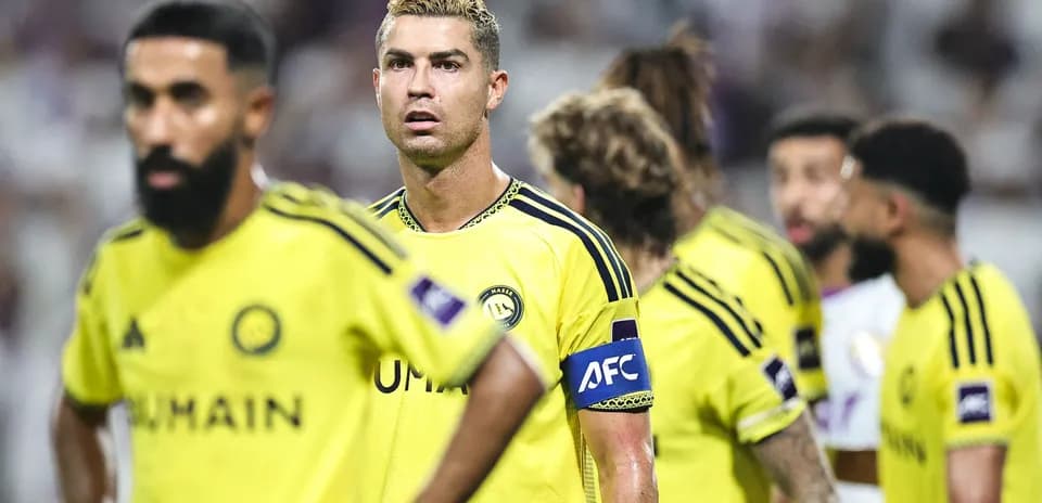 Players in yellow jerseys during a football match