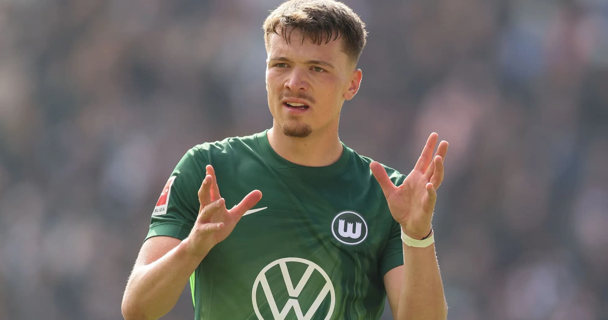 Player gesturing during a Bundesliga match