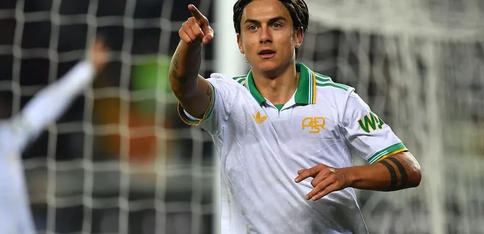 Player celebrating and pointing after scoring a goal