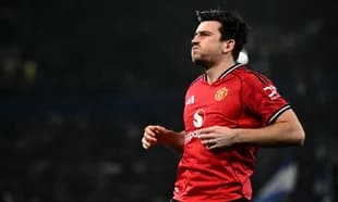 Player celebrating in Manchester United jersey during match