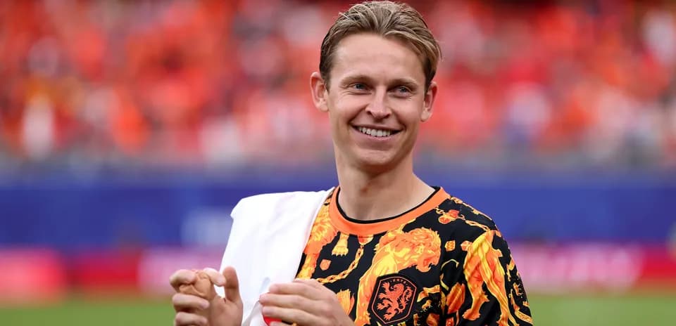 Player in colorful shirt smiling on the field