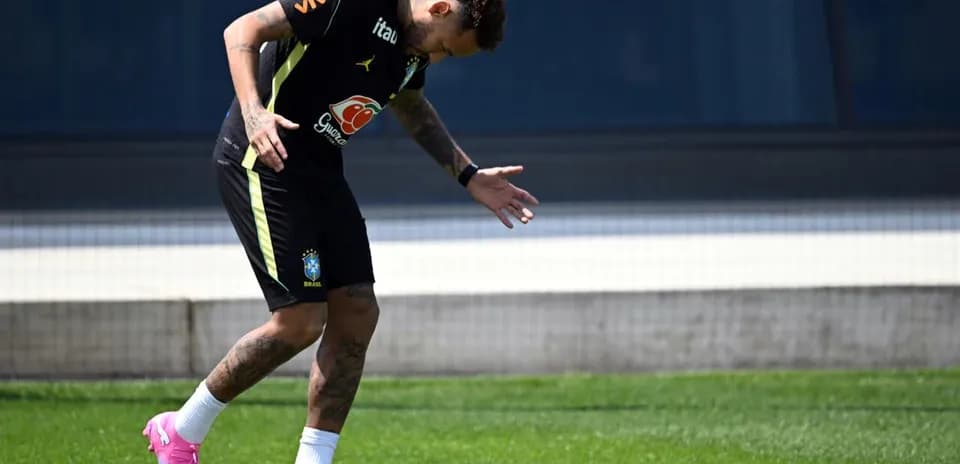 Neymar training on the pitch wearing Brazil kit