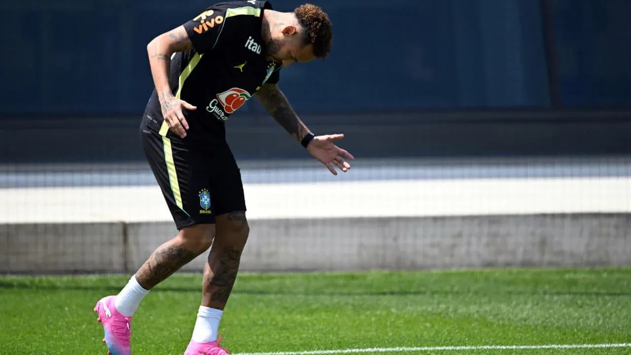 Neymar training on the pitch wearing Brazil kit