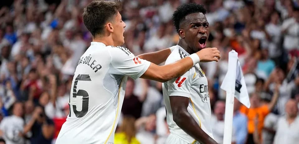 Vinicius Junior celebrating with teammate