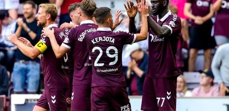 Hearts players celebrating a goal during match