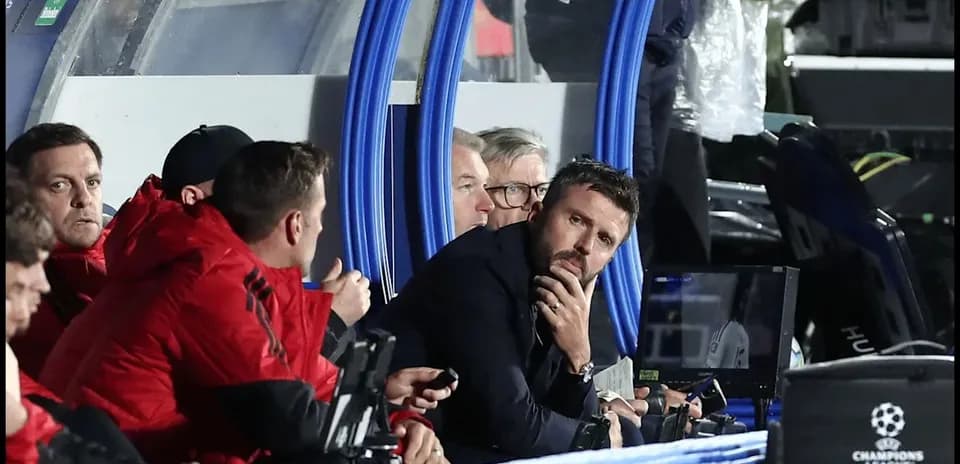 Coaches discussing strategy in the dugout